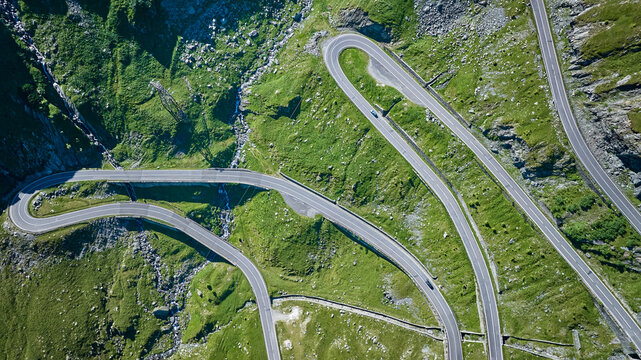 Aerial shot of directly above the Transfagarasan Highway, mountain road on the Carpathian Mountains, one of the 10 most beautiful roads in the world, Romania, Eastern Europe