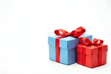 Obraz premium Classic Blue and Red Gift Boxes Tied with Vibrant Red Ribbons