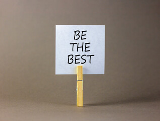 Motivational be the best symbol. Concept words Be the best on beautiful white paper on clothespin....