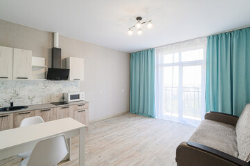 interior apartment kitchen and dining room, refectory area, cooking equipment, table furniture, stove