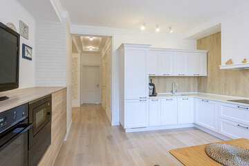 interior apartment kitchen and dining room, refectory area, cooking equipment, table furniture, stove