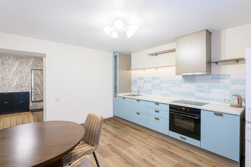 interior apartment kitchen and dining room, refectory area, cooking equipment, table furniture, stove