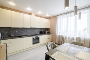 interior apartment kitchen and dining room, refectory area, cooking equipment, table furniture, stove