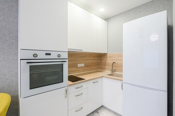 Fototapeta premium interior apartment kitchen and dining room, refectory area, cooking equipment, table furniture, stove