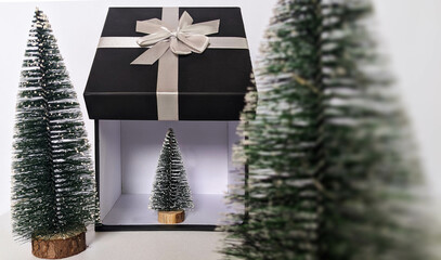 Christmas tree decoration with gift box cozy house
