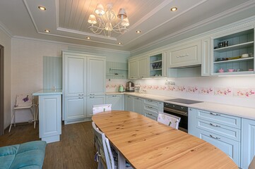 interior apartment kitchen and dining room, refectory area, cooking equipment, table furniture, stove