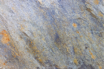 Rustic Stone Tile Texture with Weathered Gray and Warm Orange Accents