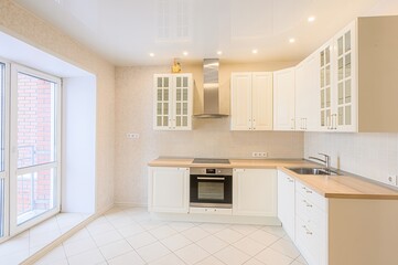 interior apartment kitchen and dining room, refectory area, cooking equipment, table furniture, stove