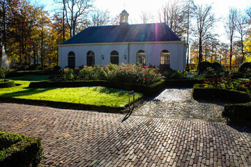 Charming Garden with Sunlit Building