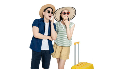 portrait of asian couple wearing travel clothes,  suitcases and posing on white background