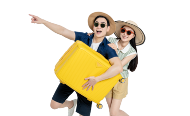 portrait of asian couple wearing travel clothes, carrying suitcases and posing on white background
