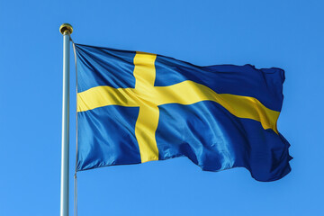 A Swedish flag on a clear blue sky background