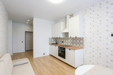 interior apartment kitchen and dining room, refectory area, cooking equipment, table furniture, stove