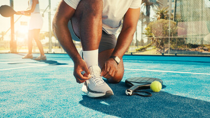 Man, hands and tie shoes for tennis with start, safety and regulation sneakers on court. Padel...
