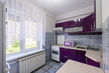 interior apartment kitchen and dining room, refectory area, cooking equipment, table furniture, stove