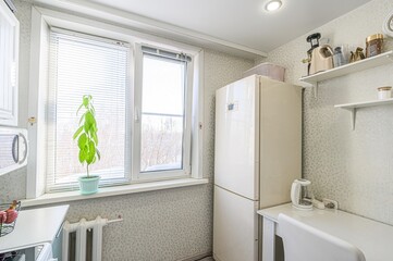 interior apartment kitchen and dining room, refectory area, cooking equipment, table furniture,...