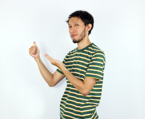 Man Presenting Something Showing Approval Against a Plain Background