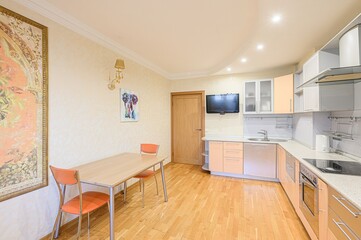 interior apartment kitchen and dining room, refectory area, cooking equipment, table furniture, stove