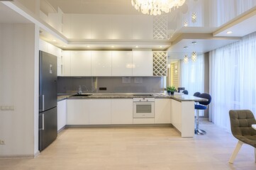 interior apartment kitchen and dining room, refectory area, cooking equipment, table furniture, stove