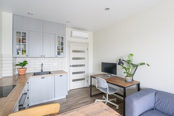 interior apartment kitchen and dining room, refectory area, cooking equipment, table furniture, stove