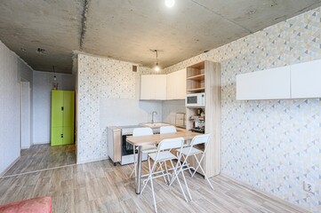 interior apartment kitchen and dining room, refectory area, cooking equipment, table furniture, stove