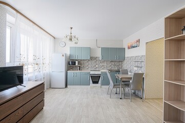 interior apartment kitchen and dining room, refectory area, cooking equipment, table furniture, stove