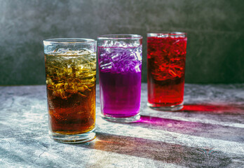 A lot of Soft drinks in colorful and flavorful glasses on the table,Glasses with sweet drinks with...