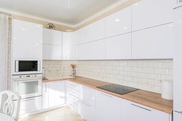 interior apartment kitchen and dining room, refectory area, cooking equipment, table furniture, stove