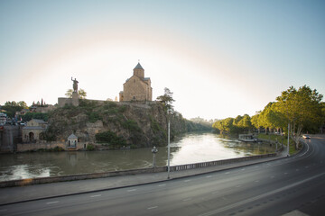 Beautiful landscape of historical Tbilisi, Kura river and Metekhi Church © artmim