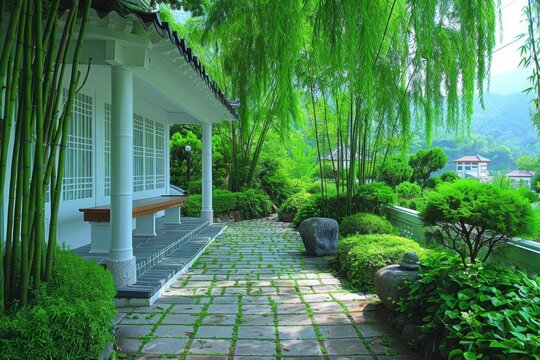 An elegant garden scene with bamboo and green weeping willows