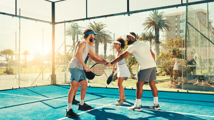 People, tennis and sport with hands together for fitness match or game time on outdoor court. Group, huddle or padel players piling with stack in unity for solidarity, support or teamwork at start