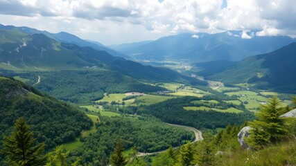 Serene Mountain Valley Landscape Lush Green Foliage, Winding Roads, and Distant Peaks under a Partly Cloudy Sky