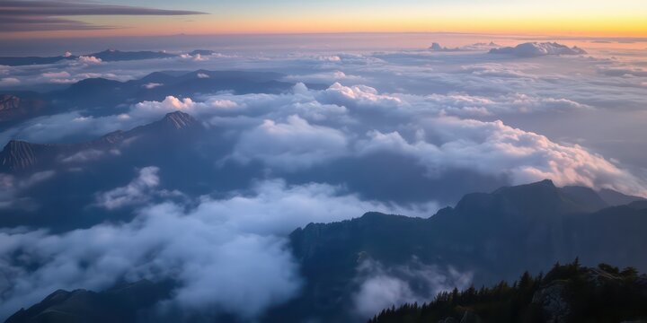 Serene mountain vista at dawn, a breathtaking panorama of rolling clouds and majestic peaks bathed in soft light.