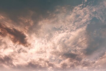Obraz premium Soft pastel hues diffuse across a serene, abstract sky, creating a tranquil and ethereal natural background.