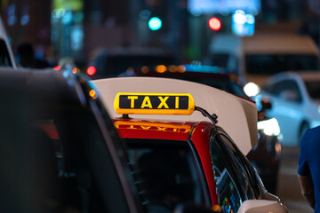 Taxi Moving Through City Traffic
