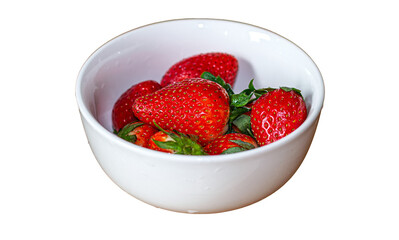 Strawberries in a deep white plate on a transparent background.