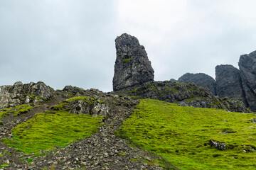 Misty skies and dramatic rock formations at The Storr, Isle of Skye. A breathtaking landscape of pure adventure, solitude, and raw nature perfect for trekking and unforgettable exploration.
