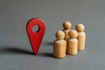 A red location marker and a group of wooden figures