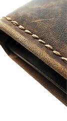 Close-up view of aged leather wallet. Stitching and texture detail