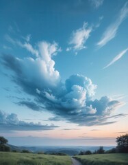 Fototapeta premium A vibrant field of lush green grass stretches under a clear blue sky, with gentle sunlight illuminating the blades, creating a serene and peaceful atmosphere.