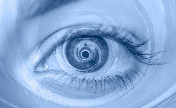 Fototapeta Hypnosis Spiral in eye with vertigo -  Image of abstract spiral eye 