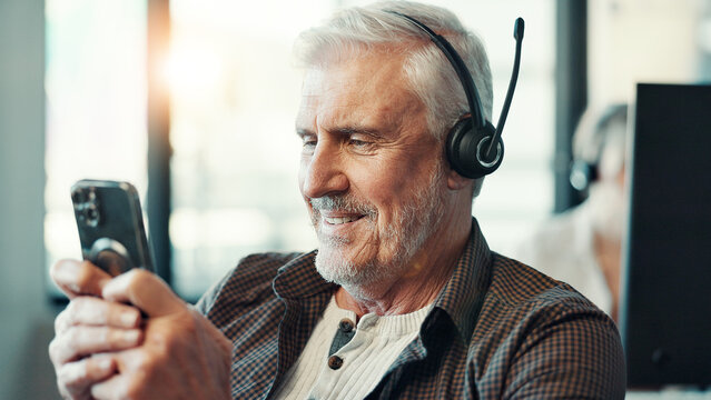 Call center, headset and man typing with phone for customer service break, text message and mobile chat. Agent, mature person and happy with smartphone for social media scroll and check notifications