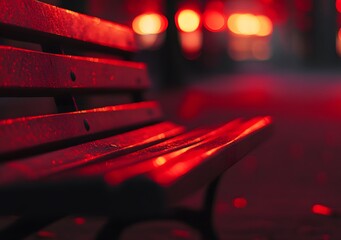 Beautiful wooden benches on the city street, with a background of a red road in the park, bathed in the early morning light.