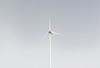 Fototapeta premium Single White Wind Turbine Against a Clear Sky Clean Energy Source Image
