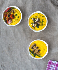 Delicious vegan homemade dishes with corn porridge and grilled vegetables. Polenta with vegetables. Healthy food for every day for vegans.