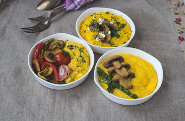 Homemade dishes with corn porridge and grilled vegetables. Traditional Italian polenta with vegetables. Healthy food for every day for vegans.