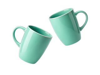 Bright and stylish mug mockup featuring two turquoise mugs tilted at angle creating lively and modern aesthetic