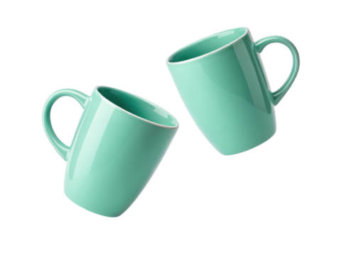 Bright and stylish mug mockup featuring two turquoise mugs tilted at angle creating lively and modern aesthetic