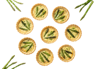 Delicious quiche tarts filled with creamy goodness and topped with fresh asparagus create delightful culinary experience