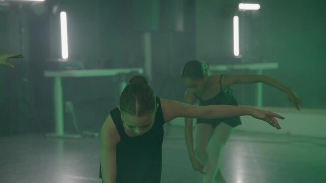 Young girls in dance class performing incredibly majestic dancing
